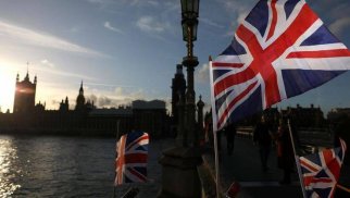 Britaniya iqtisadiyyatı iyunda cüzi böyüyüb
