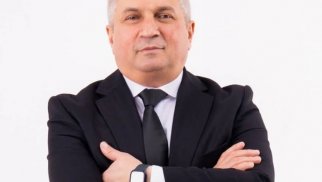Etimad Bayramovun ticarət mərkəzinin də borcu var