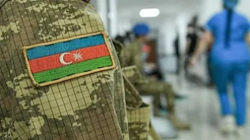 Инвалиды войны и семьи шехидов освобождены от госпошлин при регистрации имущества