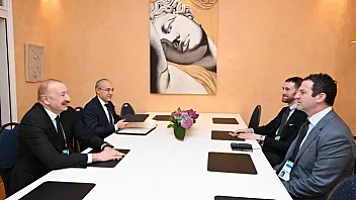 İlham Əliyev Münxendə “The Goldman Sachs”ın qlobal məsələlər üzrə prezidenti ilə görüşüb